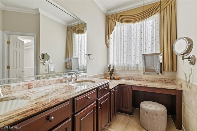 bathroom featuring vanity and ornamental molding