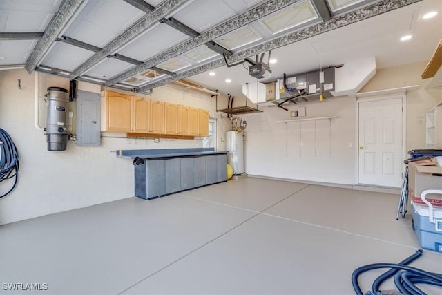 garage featuring a garage door opener and water heater