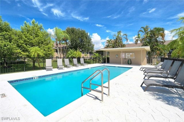 view of swimming pool featuring a patio