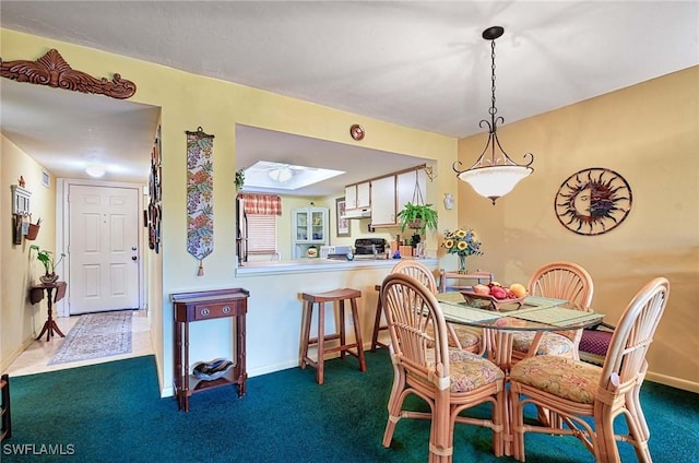 view of carpeted dining room