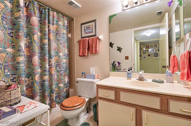 full bathroom featuring vanity, toilet, and shower / bath combo