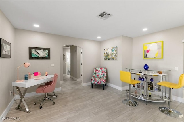 office space featuring light wood-type flooring