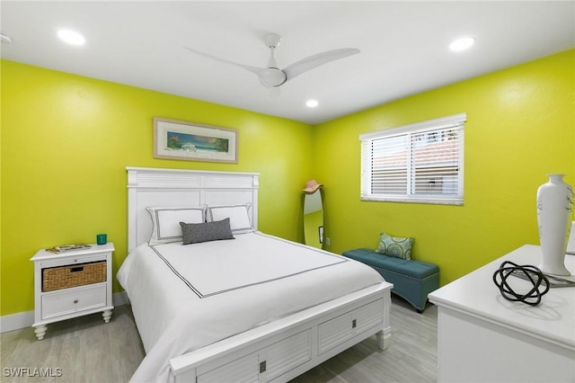 bedroom featuring ceiling fan and light wood-type flooring