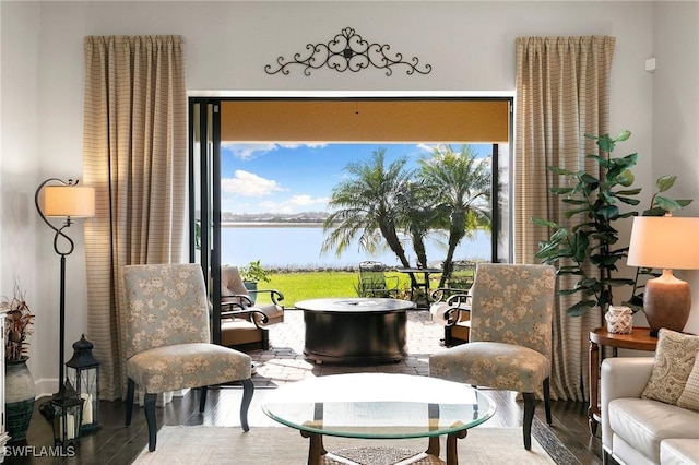 sitting room with hardwood / wood-style floors