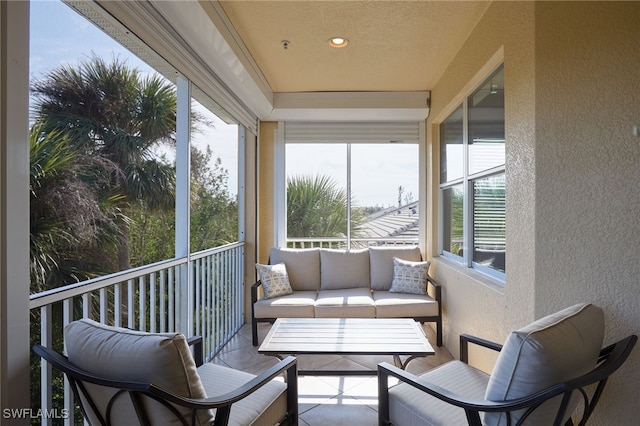 sunroom featuring a healthy amount of sunlight