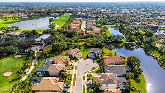 bird's eye view with a water view