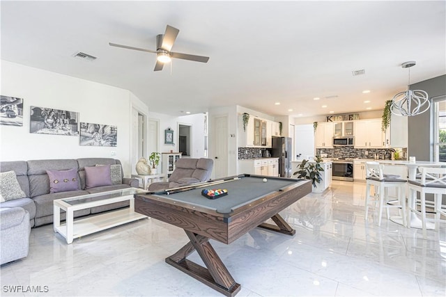 playroom with ceiling fan and pool table