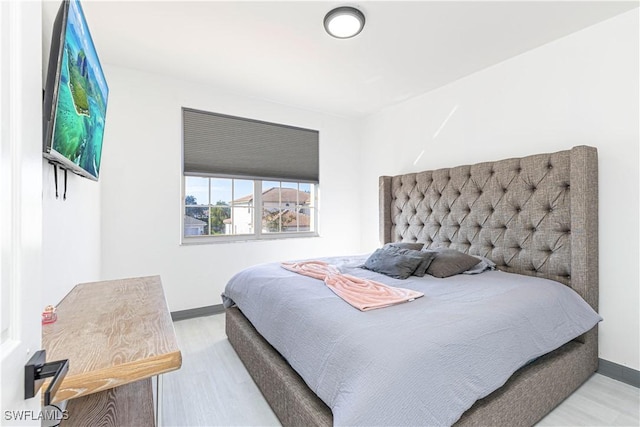 bedroom featuring light hardwood / wood-style floors