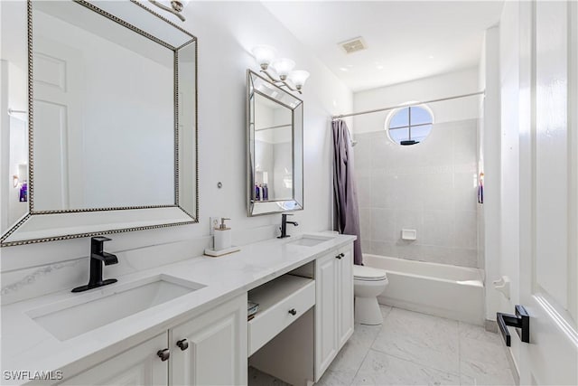 full bathroom with vanity, shower / bath combination with curtain, and toilet