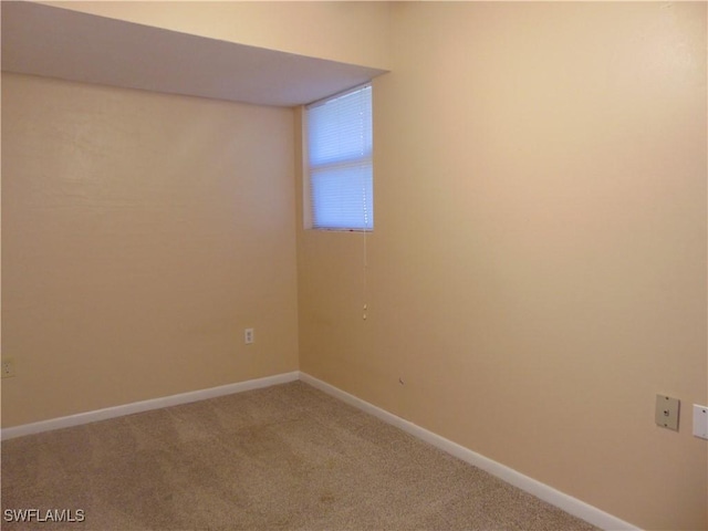 view of carpeted spare room