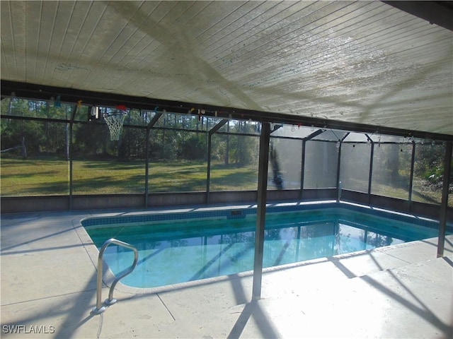 view of pool featuring a patio area