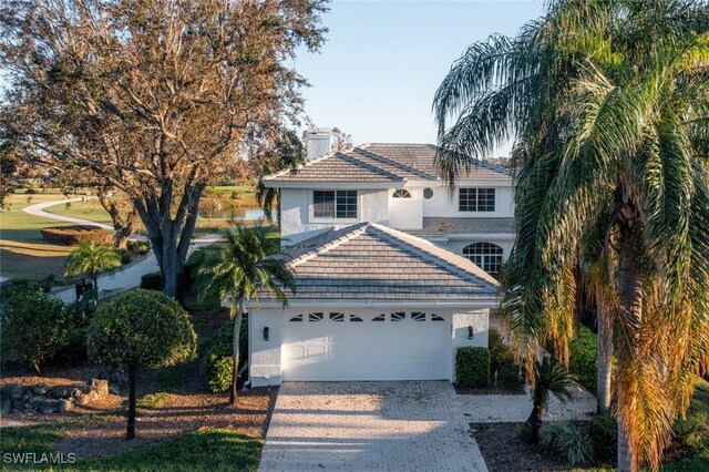 view of front of home with a garage