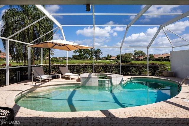 view of pool featuring an in ground hot tub, a lanai, and a patio area