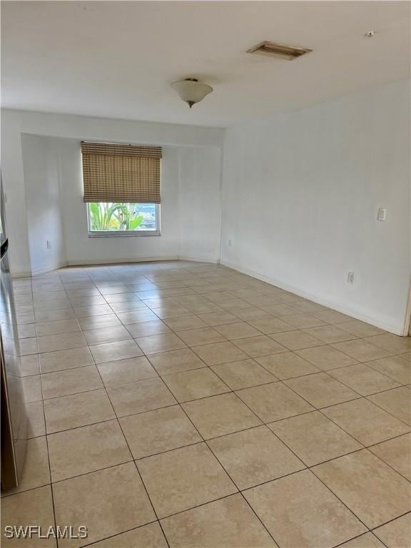 view of tiled empty room