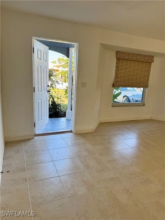 entrance foyer featuring light tile patterned floors