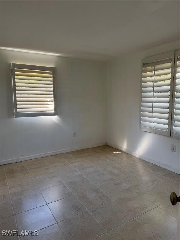 view of tiled spare room