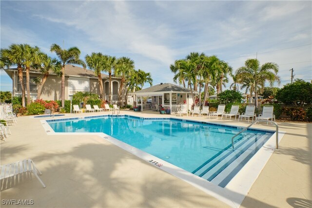 pool featuring a patio area