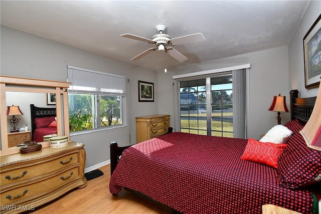 bedroom featuring light wood-type flooring and ceiling fan