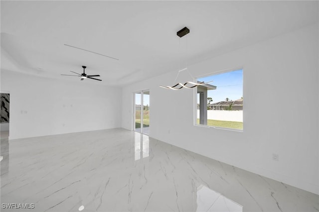 spare room featuring ceiling fan