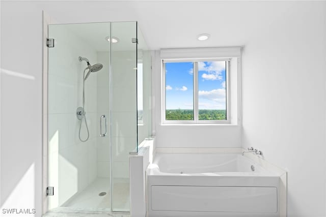 bathroom with independent shower and bath