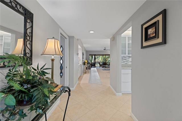 hallway with light tile patterned flooring