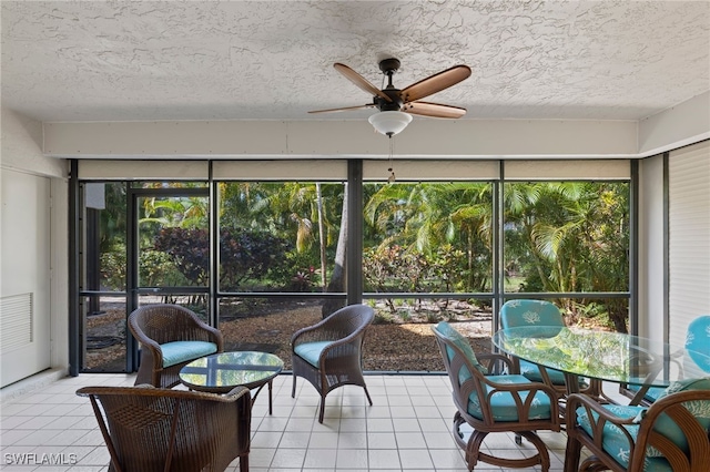 sunroom / solarium with ceiling fan