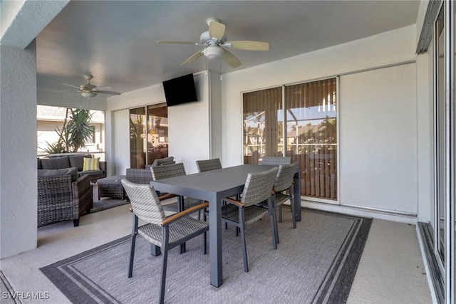 exterior space with ceiling fan