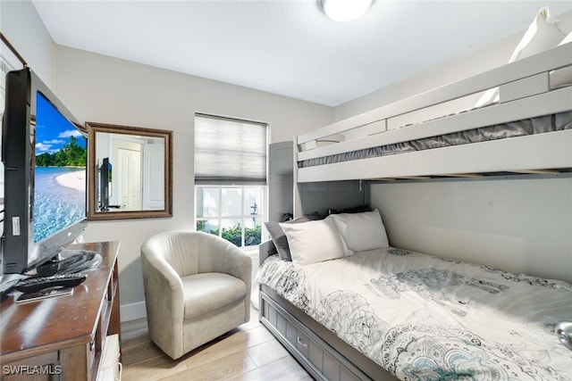 bedroom featuring light wood finished floors