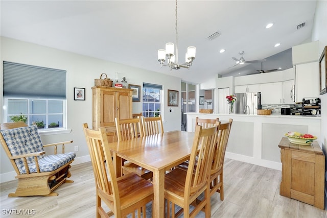 dining area with lofted ceiling, recessed lighting, visible vents, and light wood-type flooring