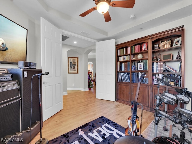 interior space featuring light wood-type flooring and ceiling fan