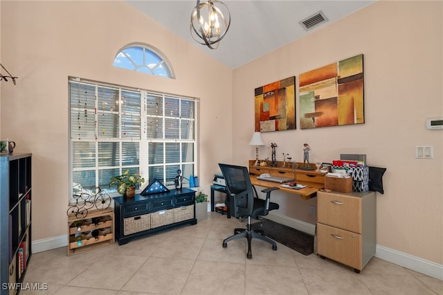 tiled office featuring lofted ceiling and a notable chandelier