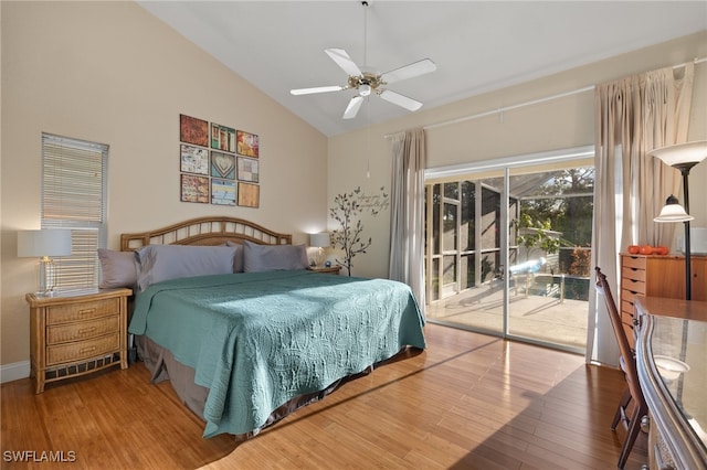 bedroom with hardwood / wood-style floors, ceiling fan, access to exterior, and high vaulted ceiling