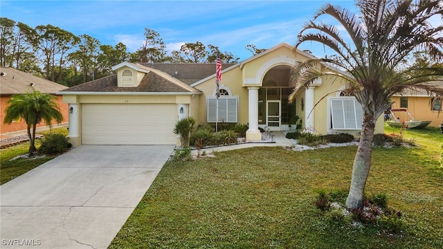 single story home featuring a garage and a front lawn