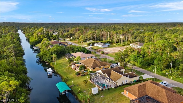 bird's eye view with a water view