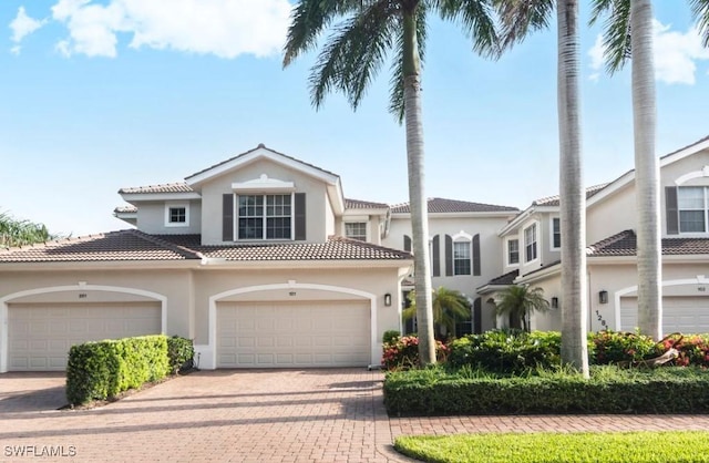 mediterranean / spanish-style house featuring a garage