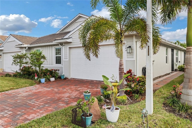 view of front of property featuring a garage