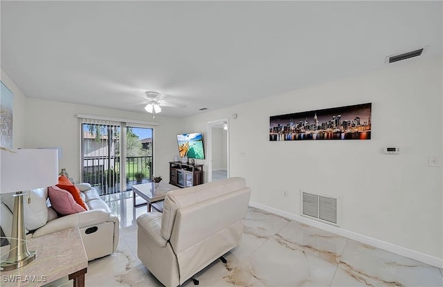 living room with ceiling fan