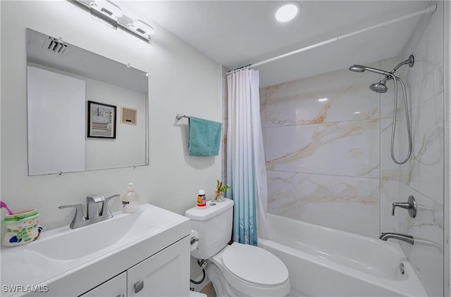 full bathroom with toilet, vanity, and shower / tub combo with curtain