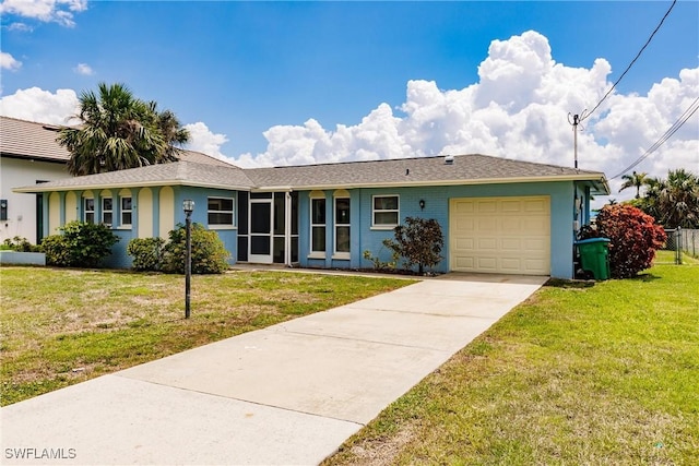 ranch-style house with a garage and a front yard