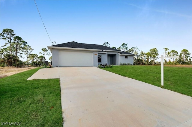 ranch-style house with a garage and a front lawn