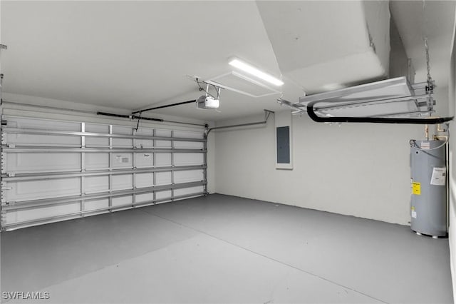 garage featuring electric panel, electric water heater, and a garage door opener