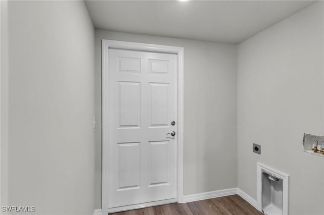 clothes washing area featuring hookup for an electric dryer, dark hardwood / wood-style floors, and washer hookup