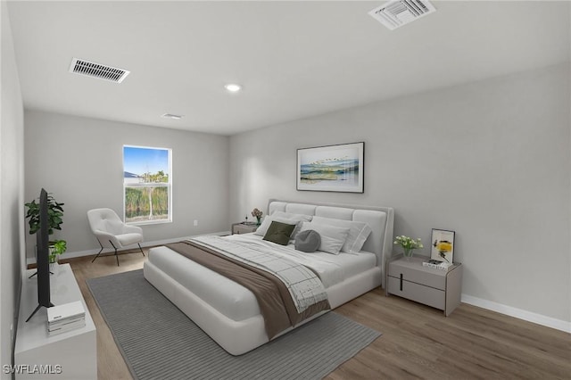 bedroom featuring wood-type flooring