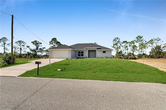 single story home with a garage and a front lawn