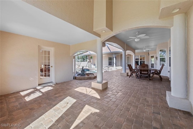 view of patio featuring ceiling fan