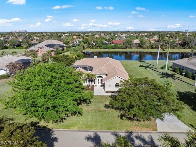 bird's eye view with a water view