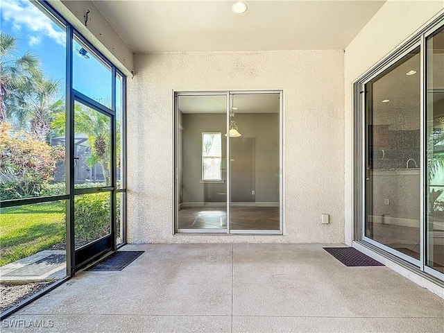 view of unfurnished sunroom