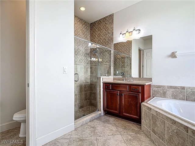 full bathroom with vanity, toilet, and independent shower and bath