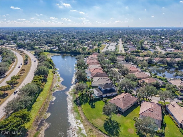 bird's eye view with a water view