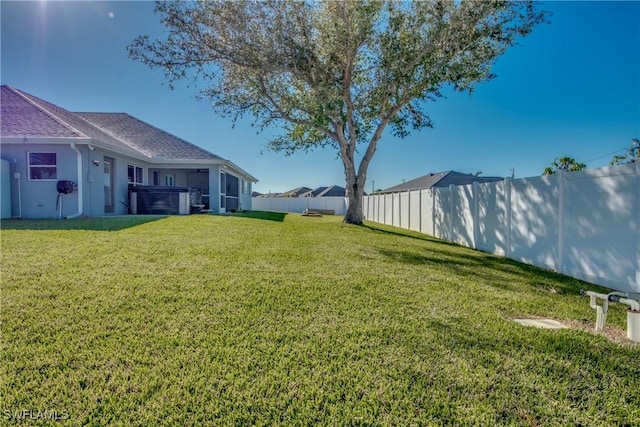 view of yard featuring a hot tub